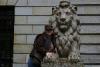 Katie poses with the lion.