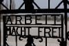 "Arbeit macht frei" (work makes free) at the gate of the Dachau concentration camp.