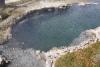 Ein kleiner heißer Teich direkt am Firehole Fluß.