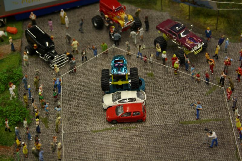 2006-11-25 09:56:20 ** Germany, Hamburg, Miniature Wonderland ** Unfortunately nothing moves in this scene. Would have been interesting to see the cars after the monstertruck was done with them.
