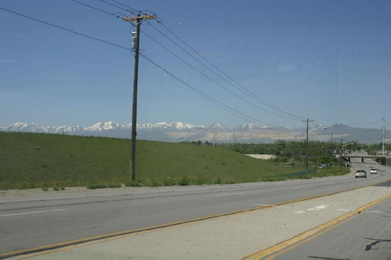 2005-05-22 11:43:36 ** Utah ** Driving west on 7800 South. In the mountains on the horizon is the copper mine.