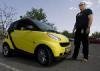 Photo of me and my smart from our local paper, "Salt Lake Tribune".