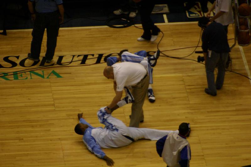 2008-03-03 18:50:42 ** Basketball, Utah Jazz ** Stretching. Relaxed on the floor in the background is Andrei.