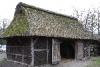 Garage with thatched roof.