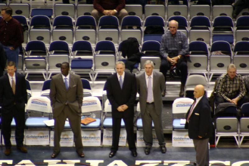 2008-03-03 20:23:20 ** Basketball, Utah Jazz ** Jerry Sloan, with the gray suit in the middle of the picture, is the coach of the Jazz.