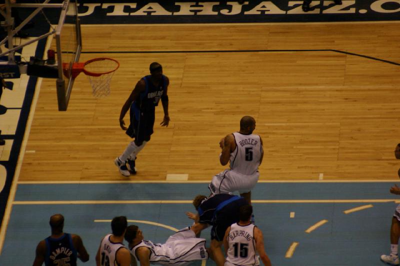 2008-03-03 21:15:00 ** Basketball, Utah Jazz ** Commotion under the Utah Jazz basket, but Carlos Boozer has got the ball under control.