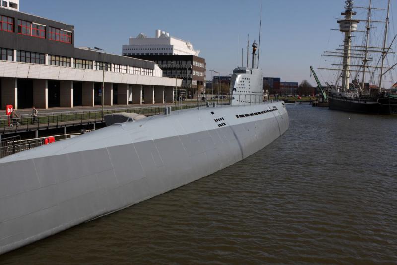 2010-04-15 16:01:10 ** Bremerhaven, Germany, Submarines, Type XXI, U 2540 ** Starboard side of U 2540. Normally, boats of this type were lower at the water with the water line approximately at the change of the two gray tones. Most of the batteries have been removed and this made the submarine a lot lighter. Doing this allowed the addition of an entrance and an exit on the port side.