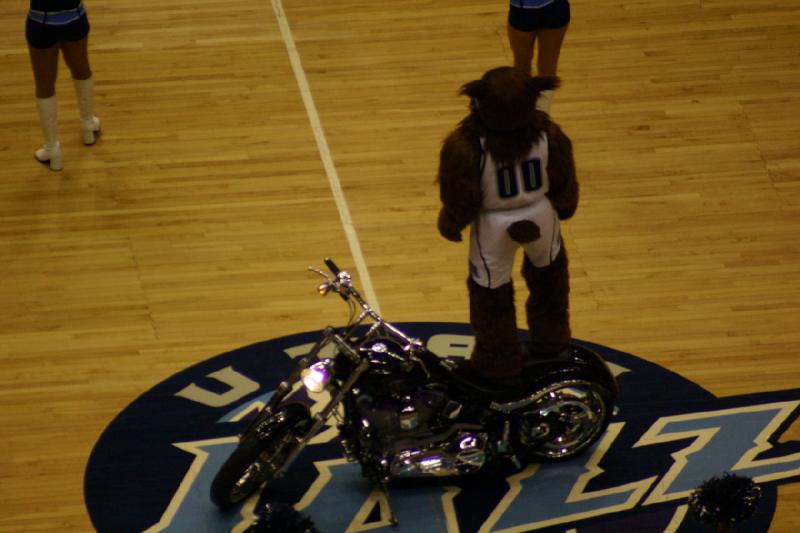 2008-03-03 19:07:20 ** Basketball, Utah Jazz ** The mascot stands on the motorbike.
