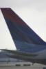 Tail in the colors of Delta Airlines.
