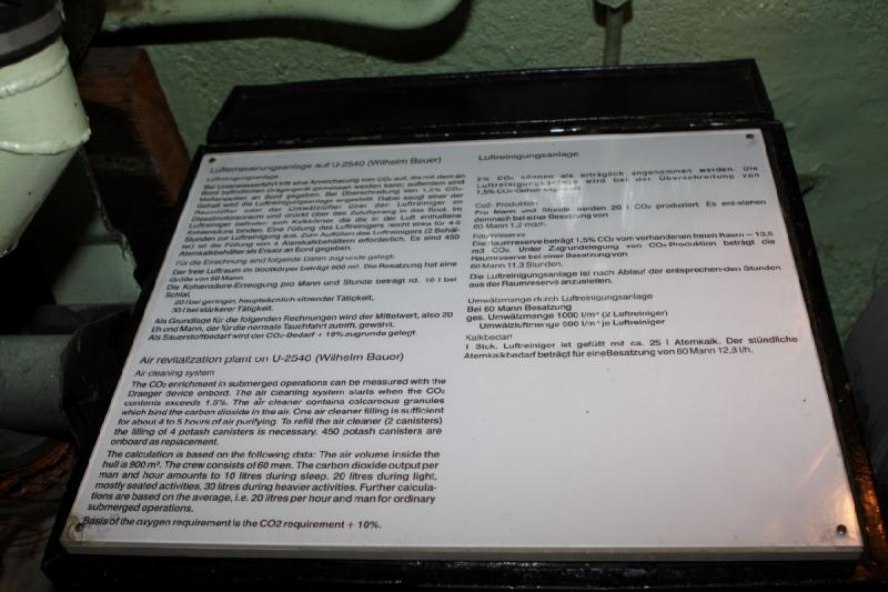 2010-04-15 15:53:23 ** Bremerhaven, Germany, Submarines, Type XXI, U 2540 ** Air revitalization plant on U-2540 (Wilhelm Bauer)

Air cleaning system

The CO2 enrichment in submerged operations can be measured with the Dräger device onboard. The air cleaning system starts when the CO2 content exceeds 1.5 %. The air cleaner contains calcareous granules which bind the carbon dioxide in the air. One air filter filling is sufficient for about 4 to 5 hours of air purifying. To refill the air cleaner (2 canisters) the filling of 4 potash canisters is necessary. 450 potasch canisters are onboard as replacement.

The calculation is based on the following data: The air volume inside the hull is 900 m³. The crew consists of 60 men. The carbon dioxide output per man and hour amounts to 10 litres during sleep, 20 liters during light, mostly seated activities, 30 litres during heavier activities. Further calculations are based on the average, i.e. 20 litres per hour and man for ordinary submerged operations.

Basis of the oxygen requirement is the CO2 requirement + 10 %.